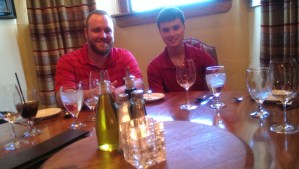 Conor taking a break from college, sitting next to Heather's brother, Ryan.